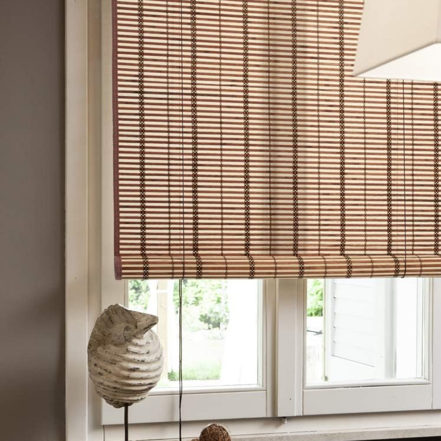 Tapparella a rullo in bambù, con arrotolamento a carrucola